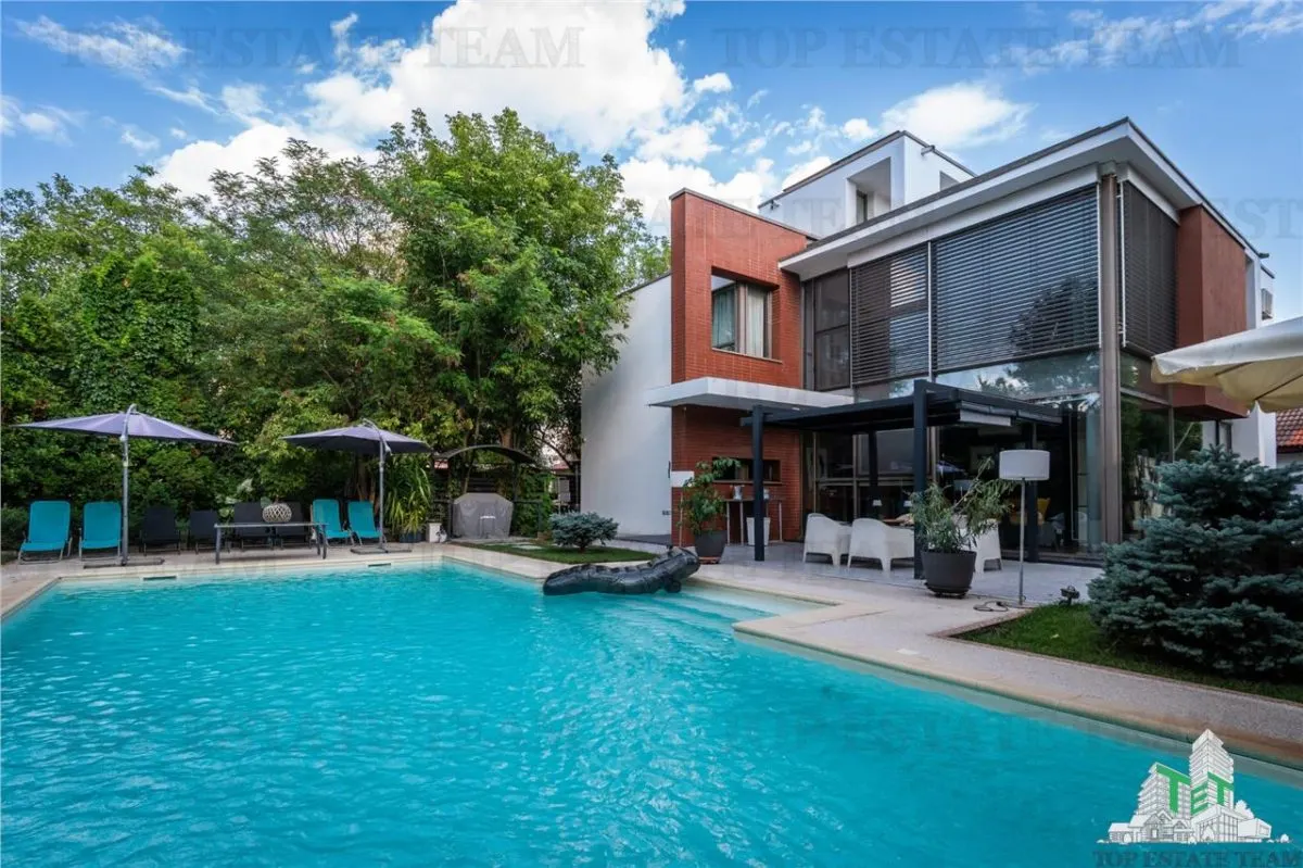 Vila premium cu 7 camere, piscina privata si terasa de 90 mp, situata in Otopeni - foto 2